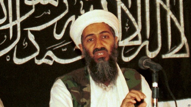 in this 1998 file photo made available on march 19 2004 osama bin laden is seen at a news conference in afghanistan photo voice of america