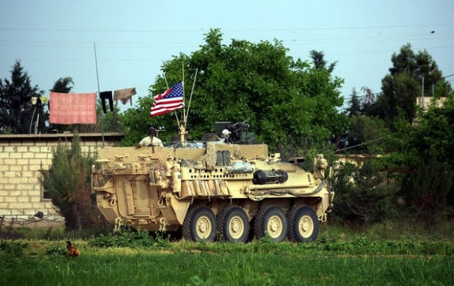 us forces accompanied by kurdish people 039 s protection units ypg fighters drive their armoured vehicles near the northern syrian village of darbasiyah on the border with turkey photo afp us forces accompanied by kurdish people 039 s protection units ypg fighters drive their armoured vehicles near the northern syrian village of darbasiyah on the border with turkey photo afp