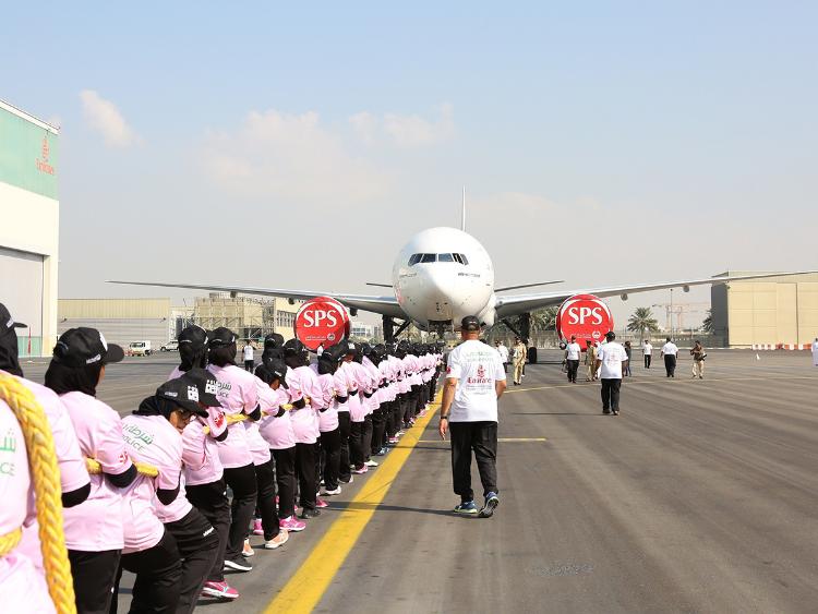 dubai police women smash world record of towing aeroplane over 100 metres