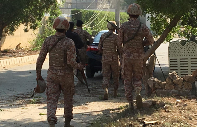 paramilitary forces and police are seen during an attack on the chinese consulate general photo reuters