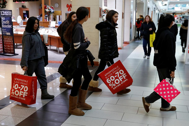 people shop during the black friday sales shopping event at roosevelt field mall in garden city new york us november 23 2018 photo reuters people shop during the black friday sales shopping event at roosevelt field mall in garden city new york us november 23 2018 photo reuters