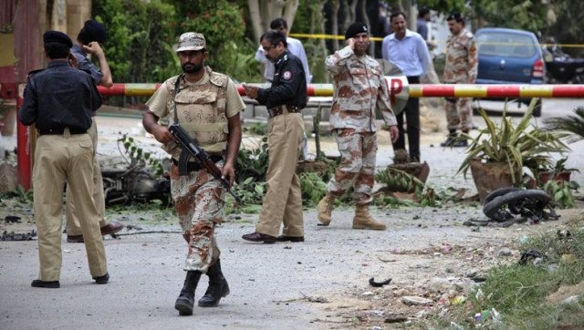a paramilitary soldier walks on site to request the media move to away from the site as policemen survey the area after a bomb attack photo reuters a paramilitary soldier walks on site to request the media move to away from the site as policemen survey the area after a bomb attack photo reuters