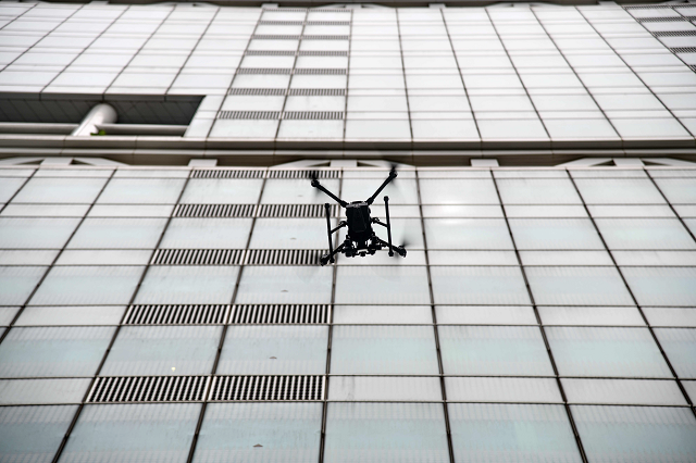 this photo taken on october 17 2018 shows a singapore technologies aerospace owned drone on a mobile landing and charging station during a demonstration in singapore photo afp this photo taken on october 17 2018 shows a singapore technologies aerospace owned drone on a mobile landing and charging station during a demonstration in singapore photo afp