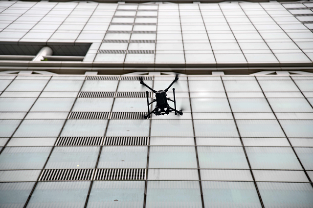 this photo taken on october 17 2018 shows a singapore technologies aerospace owned drone on a mobile landing and charging station during a demonstration in singapore photo afp