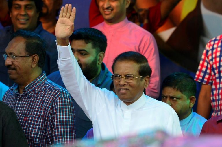 sri lanka 039 s president maithripala sirisena waves to supporters at a rally in colombo photo afp