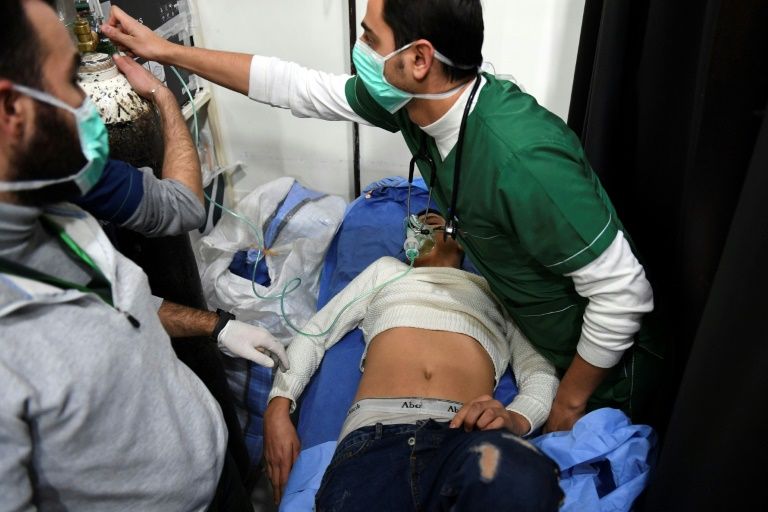 around 100 syrians struggle to breathe after toxic attack