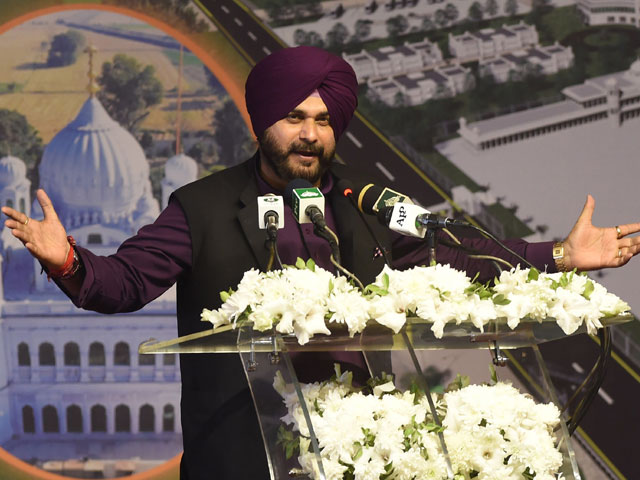 india 039 s punjab cabinet minister and former cricketer navjot singh sidhu addresses the groundbreaking ceremony for the kartarpur corridor in kartarpur on november 28 2018 photo afp