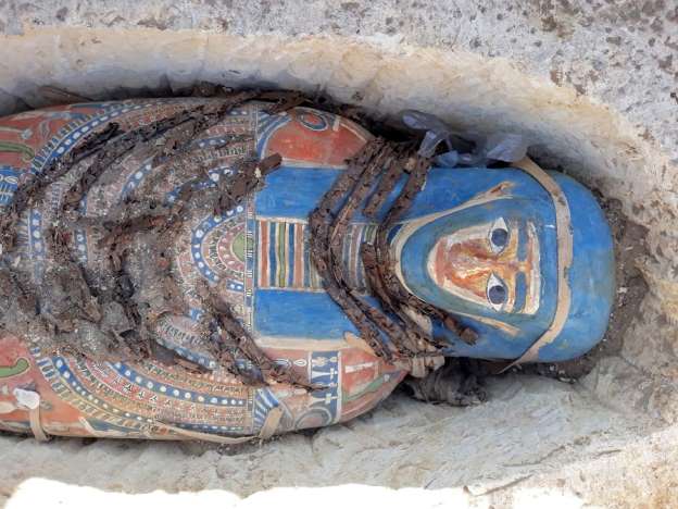 a handout picture released by the egyptian ministry of antiquities on november 28 2018 shows one of the newly uncovered mummies photo afp