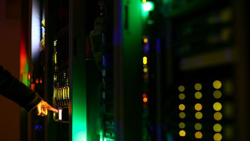 a man poses inside a server room at an it company photo reuters