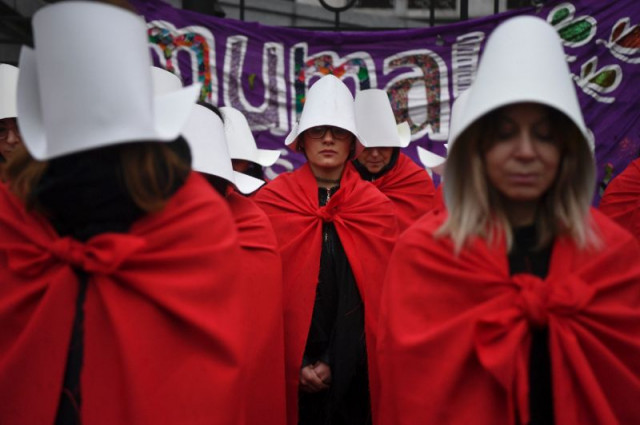 activists in favor of the legalization of abortion don costumes inspired by canadian author margaret atwood 039 s feminist dystopian novel quot the handmaid 039 s tale quot a sequel is to be published next year photo afp activists in favor of the legalization of abortion don costumes inspired by canadian author margaret atwood 039 s feminist dystopian novel quot the handmaid 039 s tale quot a sequel is to be published next year photo afp