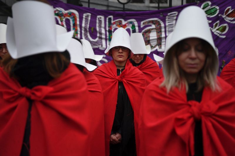 activists in favor of the legalization of abortion don costumes inspired by canadian author margaret atwood 039 s feminist dystopian novel quot the handmaid 039 s tale quot a sequel is to be published next year photo afp
