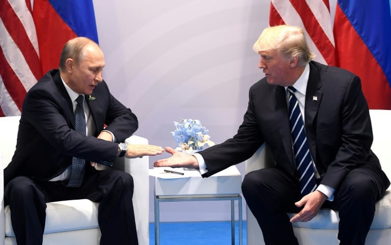 russian president putin l with american president donald trump r photo afp