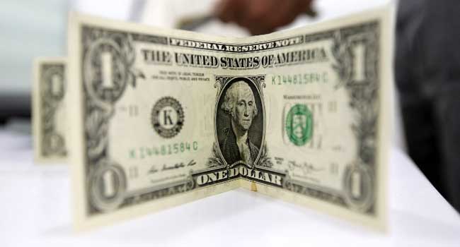 a close up shot of a dollar bill photo afp