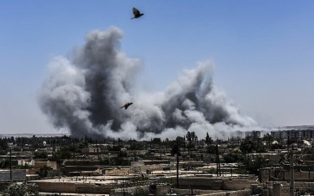 smoke billows after an airstrike in syria photo afp smoke billows after an airstrike in syria photo afp