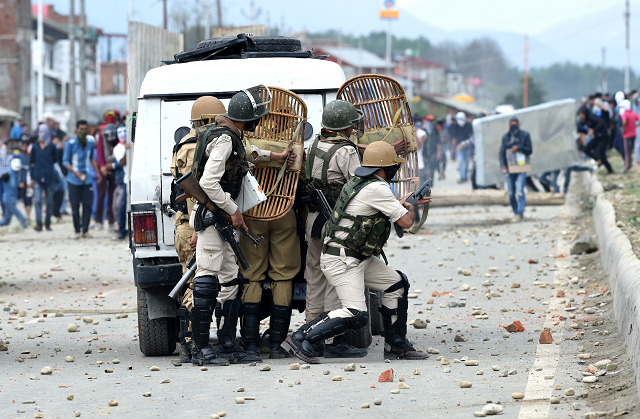 in this file photo taken on june 22 2018 indian kashmiri youths clash with indian government forces on the outskirts of srinagar following a gun fight in southern kashmir between government forces and suspected rebels   the blinding of an infant girl in kashmir with pellet shot has drawn fresh attention to the use of the indiscriminate pump action pellet gun that indian forces use for crowd control only in kashmir which has killed many and injured thousands since its introduction eight years ago photo afp