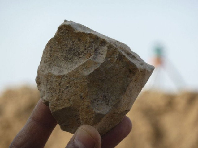 an oldowan core stone tool freshly excavated at ain boucherit from which sharp edged cutting flakes were removed photo afp an oldowan core stone tool freshly excavated at ain boucherit from which sharp edged cutting flakes were removed photo afp
