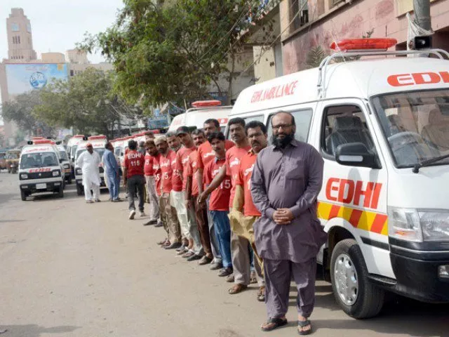 edhi foundation head faisal edhi stands with crew of the newly inducted ambulances photo rashid ajmeri express edhi foundation head faisal edhi stands with crew of the newly inducted ambulances photo rashid ajmeri express
