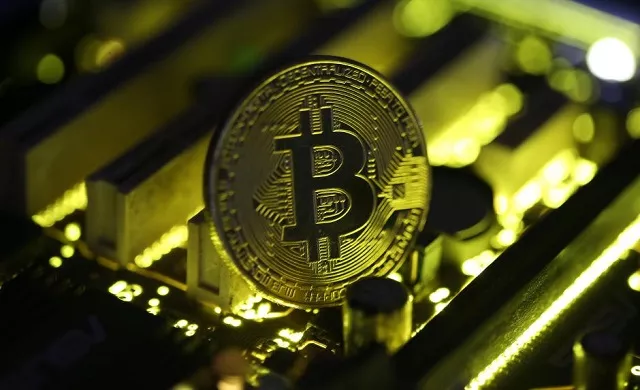 a copy of bitcoin standing on pc motherboard is seen in this illustration picture october 26 2017 photo reuters a copy of bitcoin standing on pc motherboard is seen in this illustration picture october 26 2017 photo reuters