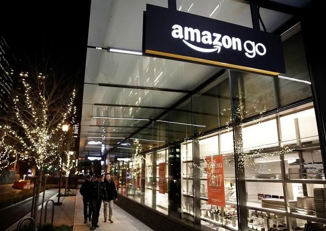 people walk by the amazon go brick and mortar grocery store without lines or checkout counters in seattle washington us december 5 2016 photo reuters people walk by the amazon go brick and mortar grocery store without lines or checkout counters in seattle washington us december 5 2016 photo reuters
