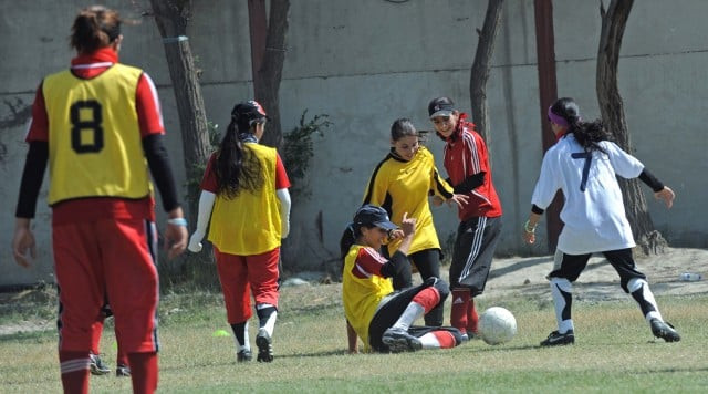 afghanistan s women s national football team members take part in a practice session at a military club in kabul photo afp afghanistan s women s national football team members take part in a practice session at a military club in kabul photo afp