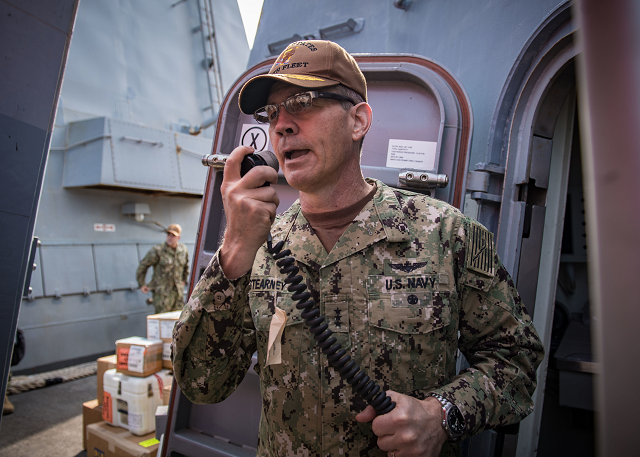 vice admiral scott stearney commander of us naval forces central command us 5th fleet and combined maritime forces speaks on the 1mc shipboard intercom to welcome the crew of the guided missile destroyer uss jason dunham ddg 109 to manama bahrain on october 24 2018 photo afp