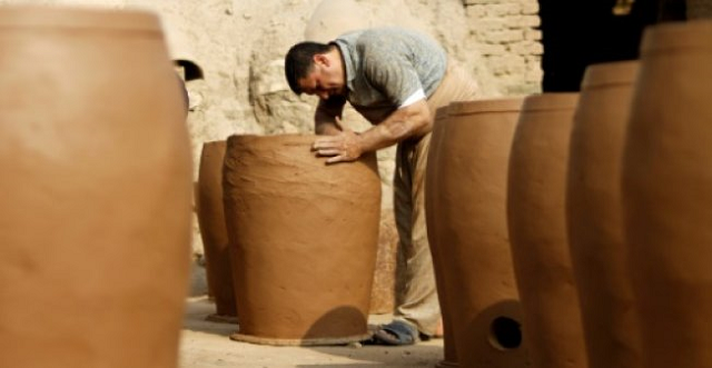 pottery has deep roots in iraq where ancient civilisations turned to clay to build their homes shape their cooking utensils and even make their ovens photo afp