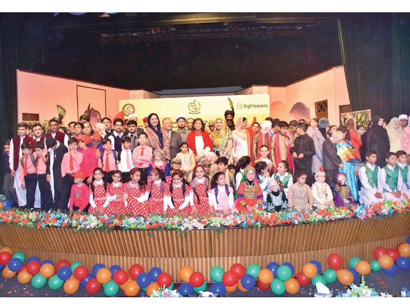 federal education parliamentary secretary in a group photo with participants of an event organised by directorate general of special education on the eve of international day of people with disabilities held at pnca photo app
