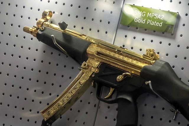 1 a gold plated weapon is displayed at the pakistani stand during egypt s first service defence exhibition in cairo on december 3 2018 at the international exhibition center photo afp 1 a gold plated weapon is displayed at the pakistani stand during egypt s first service defence exhibition in cairo on december 3 2018 at the international exhibition center photo afp
