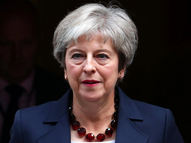 prime minister theresa may is fighting to defend a draft deal agreed with the eu photo file