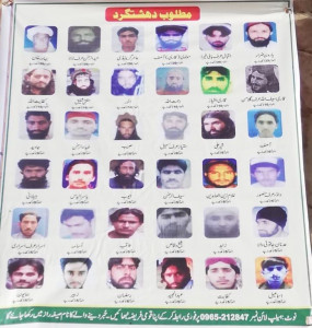 di khan displays list of wanted men in town square