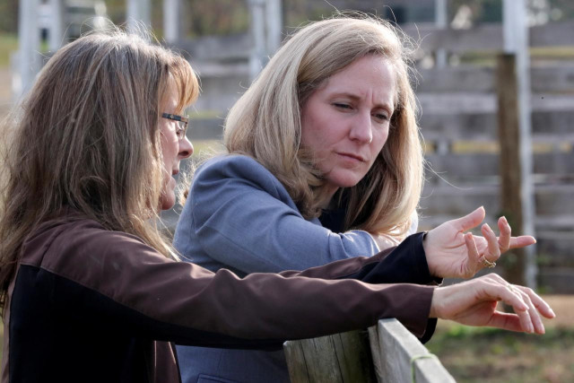 virginia democratic candidate for us representative abigail spanberger r talks with jorg huckabee mayfield during a visit to the horse rescue stables she and her husband operate in burkeville virginia us photo reuters virginia democratic candidate for us representative abigail spanberger r talks with jorg huckabee mayfield during a visit to the horse rescue stables she and her husband operate in burkeville virginia us photo reuters