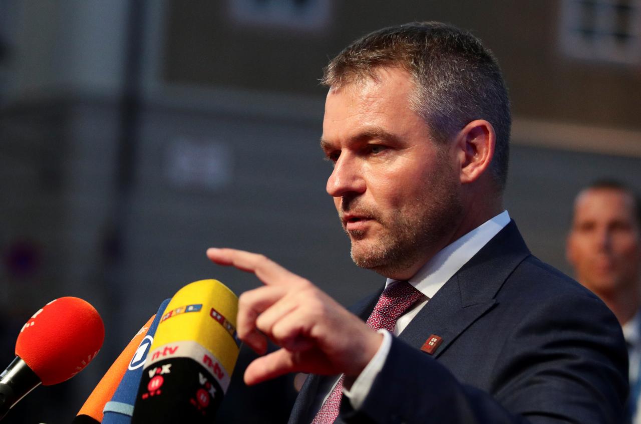 slovak prime minister peter pellegrini talks to the media as he arrives for the informal meeting of european union leaders ahead of the eu summit in salzburg austria photo reuters