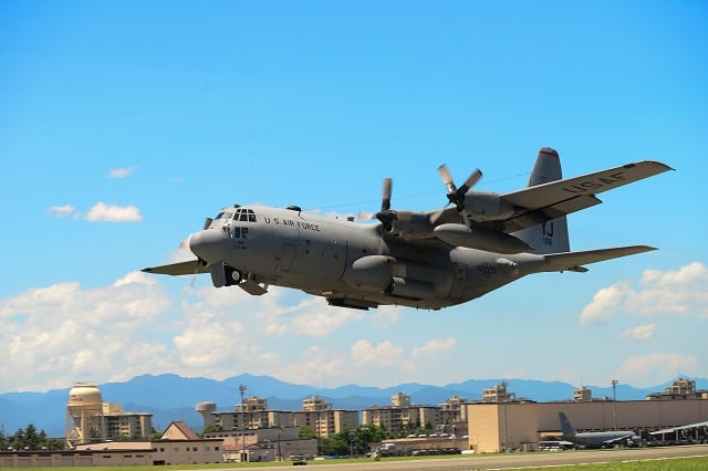 in this july 14 2015 photograph courtesy of the us air force a c 130 hercules takes off during a training exercise at yokota air base japan photo afp