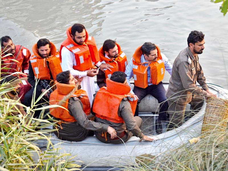 dc imran hamid sheikh leads cleanliness drive of canals in peshawar photo express