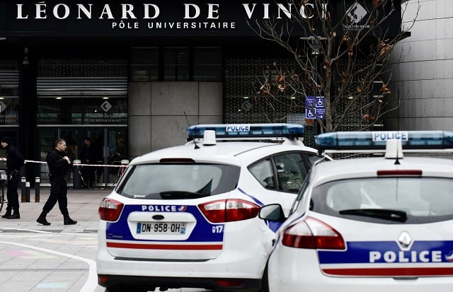 police block the access on december 5 2018 at the main entrance of the private leonard de vinci university in courbevoie northwest of paris where a 66 year old teacher was repeatedly stabbed to death and a pakistani suspect arrested photo afp police block the access on december 5 2018 at the main entrance of the private leonard de vinci university in courbevoie northwest of paris where a 66 year old teacher was repeatedly stabbed to death and a pakistani suspect arrested photo afp