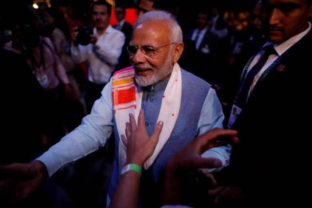 indian prime minister narendra modi greets attendees at the end of a sideline event ahead of the group 20 summit called quot yoga por la paz quot peace through yoga in buenos aires argentina photo reuters indian prime minister narendra modi greets attendees at the end of a sideline event ahead of the group 20 summit called quot yoga por la paz quot peace through yoga in buenos aires argentina photo reuters