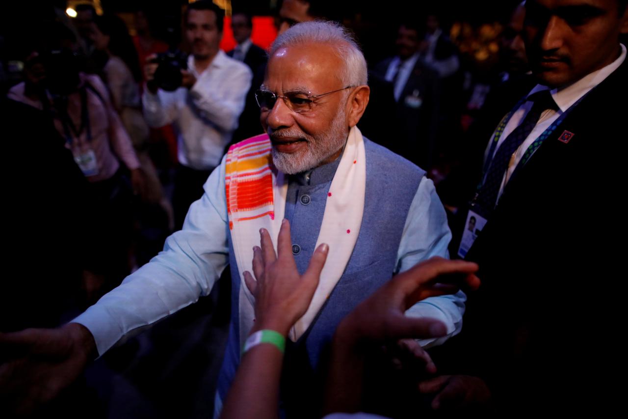 indian prime minister narendra modi greets attendees at the end of a sideline event ahead of the group 20 summit called quot yoga por la paz quot peace through yoga in buenos aires argentina photo reuters