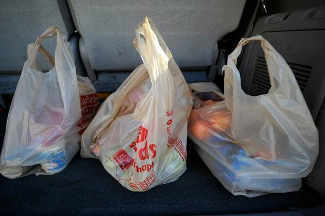 man arrested for selling black polythene bags photo reuters man arrested for selling black polythene bags photo reuters