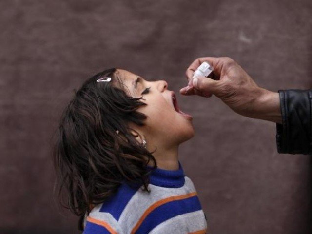 anti polio vaccine being administered to a child photo reuters