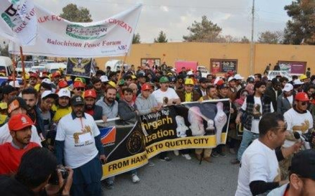 people march during a walk for mehrgarh civilisation from hanna lake to quetta photo express