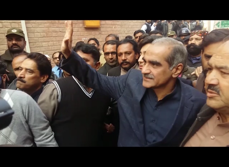 saad rafique being escorted from court premises photo express