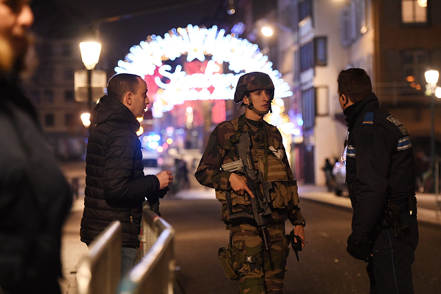 policemen speak with a military in the streets of strasbourg eastern france photo afp policemen speak with a military in the streets of strasbourg eastern france photo afp