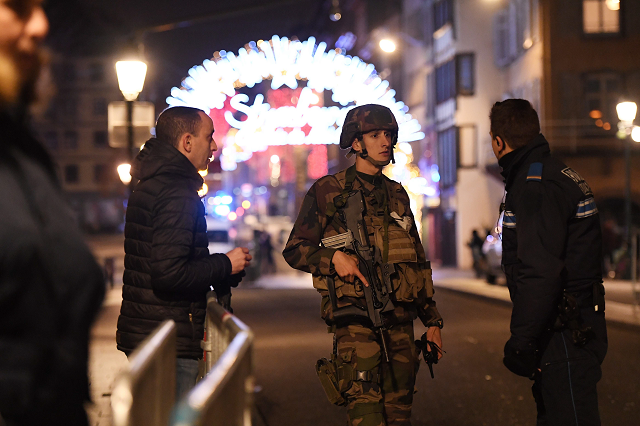 policemen speak with a military in the streets of strasbourg eastern france photo afp