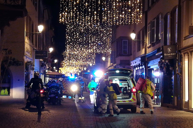 rescuers walk in the streets of strasbourg eastern france after a shooting breakout on december 11 2018 photo afp