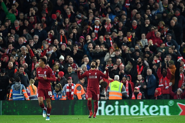 liverpool 039 s egyptian midfielder mohamed salah c celebrates scoring the opening goal during the uefa champions league group c football match between liverpool and napoli at anfield stadium photo afp