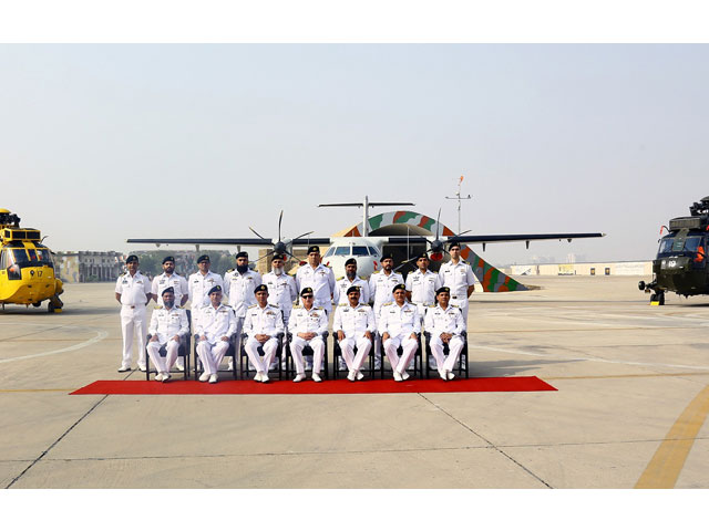 a group photo of chief of the naval staff admiral zafar mahmood with the crew members of the newly inducted pakistan navy aviation units photo pakistan navy
