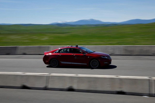 an autonomoustuff automated research development vehicle drives on the race track during a self racing cars event at thunderhill raceway in willows california us april 1 2017 photo reuters