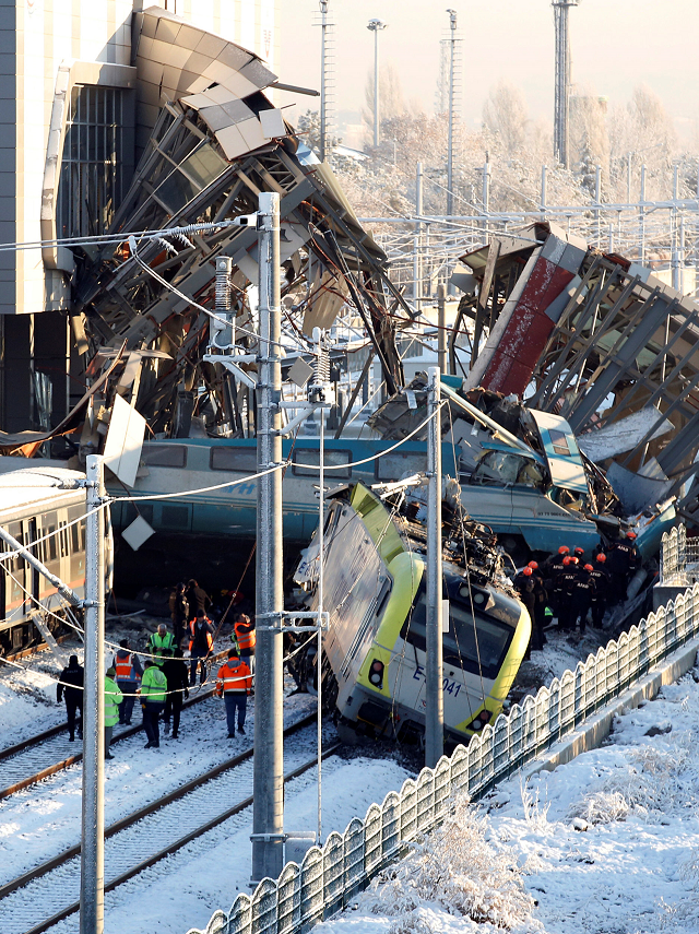 rescue workers search at the wreckage after a high speed train crash in ankara photo reuters