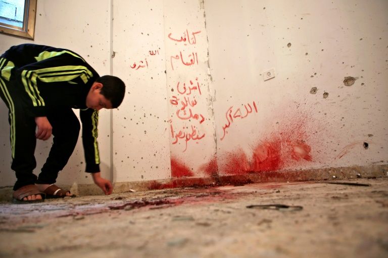 the armed wing of palestinian movement hamas said two men killed by israeli forces were its quot fighters quot photo afp