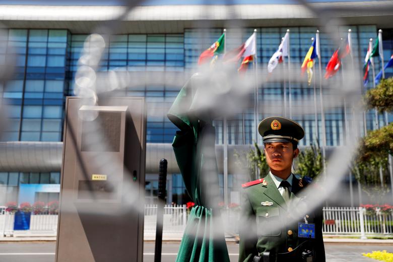 a paramilitary policemen secures the venue of the belt and road forum in beijing china may 14 2017 photo reuters